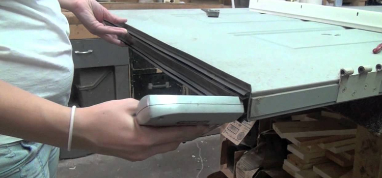 damaged steel door repair East Lake